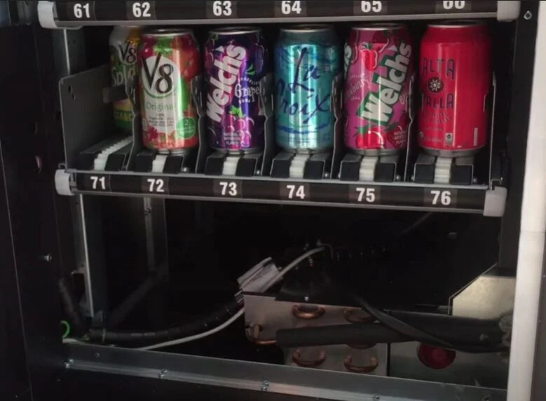 Máquina expendedora de ascensor combinada