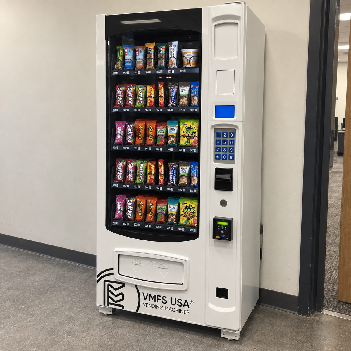 VMFS USA Snack vending machine loaded with snacks including chocolate bars, biscuits and candies