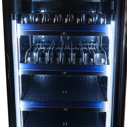 Vending machine with multiple compartments containing metal cups.
