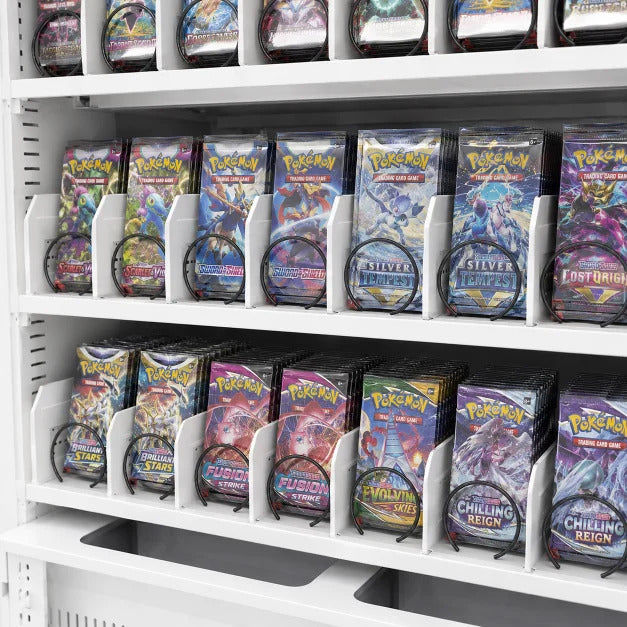 Graded cards and booster packs inside the pokemon card vending machine